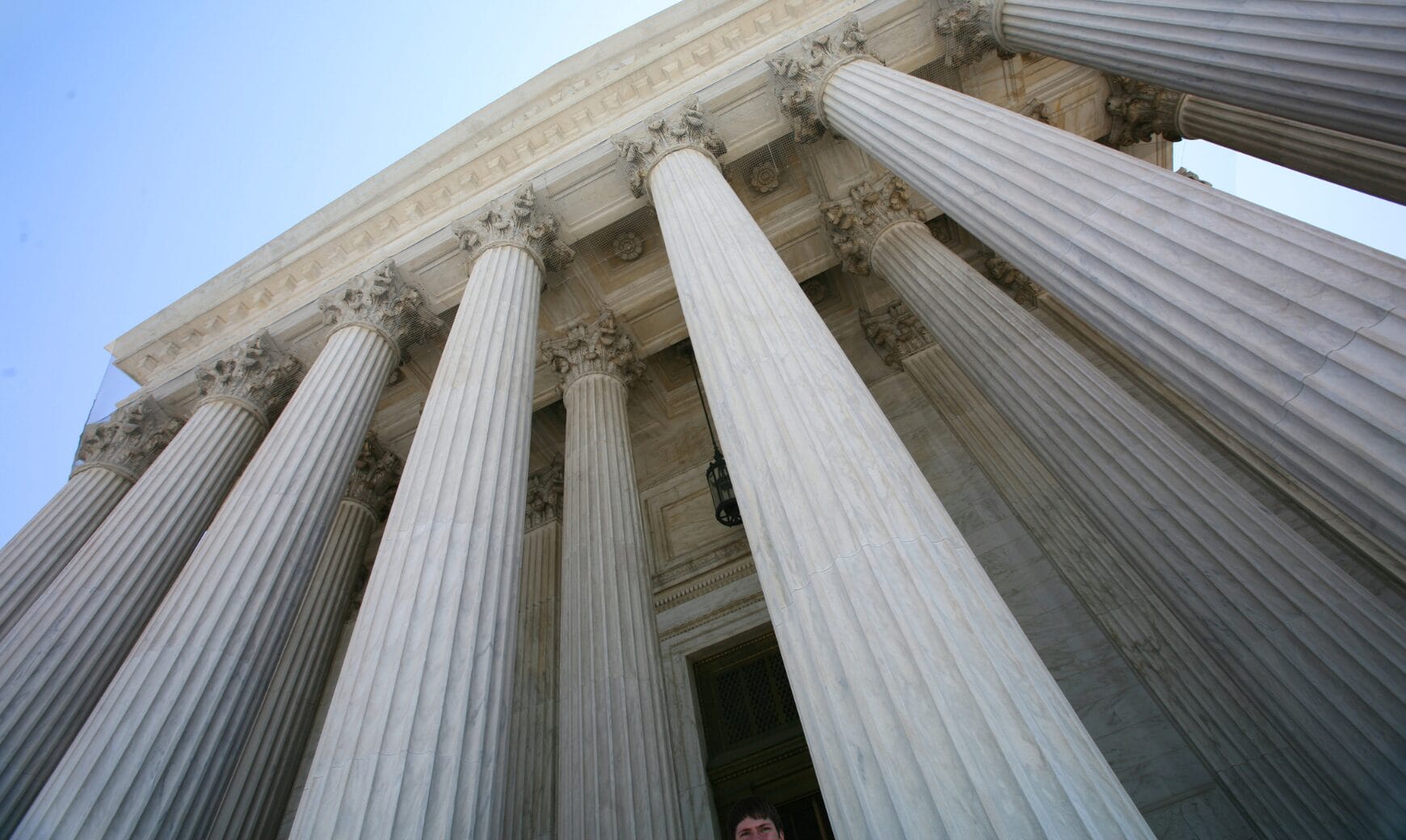 Media item displaying DOJ Antitrust Funding Jumps 5% as Congress Lifts Cap on Merger Fees